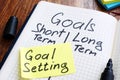 Goal setting concept. Memo stick with list of goals Royalty Free Stock Photo