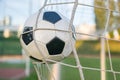 Goal - soccer or football ball in the net in stadium Royalty Free Stock Photo