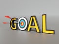 GOAL text with archery target as letter O with three arrows shot in the center Royalty Free Stock Photo