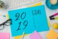 2019 goal text on colorful paper memo note with business office Royalty Free Stock Photo