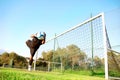 Goalie stops a ball