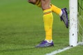 Goalkeeper cleaning his boots