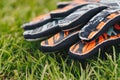 Goalkeeper Soccer Football Gloves Laying on Natural Soccer Grass Field Royalty Free Stock Photo