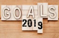 2019 goals banner - New Year resolution concept - text in vintage letters on wooden blocks Royalty Free Stock Photo