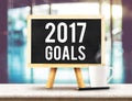 2017 goals on blackboard with easel on black marble table with c Royalty Free Stock Photo