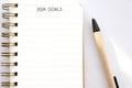 2024 goals on blank notebook paper on white background, 2024 new year mock up, template, flat lay Royalty Free Stock Photo