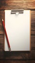 Goals and deeds setup Notepad with red pencil on wooden table