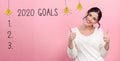 2020 goals with happy young woman