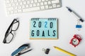 2020 Goals. New year goal, plan, action text on notepad with office supplies. Business motivation concepts ideas Royalty Free Stock Photo