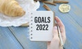 2022 goals, New year resolution. Text 2022 goals in open notepad on the table. Start new year, planning Royalty Free Stock Photo