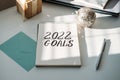 2022 goals, New year resolution. Text 2022 goals in open notepad on the table. Start new year, planning and setting Royalty Free Stock Photo