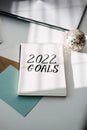 2022 goals, New year resolution. Text 2022 goals in open notepad on the table. Start new year, planning and setting Royalty Free Stock Photo