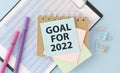 Text 2022 goals in open notepad on the table. Start new year, planning and setting goals Royalty Free Stock Photo