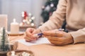 Goals plans make to do and wish list for new year christmas concept, girl writing in notebook. Woman hand holding pen on Royalty Free Stock Photo