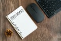 2023 goals text on note pad on top of wood desk Royalty Free Stock Photo