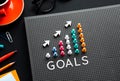 Goals text with pin garph chart on business table.vision to success Royalty Free Stock Photo