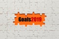 Goals 2019. White details of puzzle on orange background Royalty Free Stock Photo