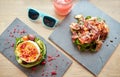 Goat cheese and ham salads on cafe table