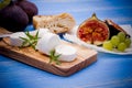 Goat cheese with ripe figs and grapes