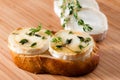 Goat cheese with thyme gratinated with honey. Royalty Free Stock Photo