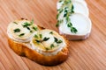 Goat cheese with thyme gratinated with honey. Royalty Free Stock Photo