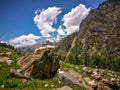 Goats standing on the rock. Beautiful view of Himalayan mountains, Kheerganga, Parvati valley, Himachal Pradesh, India