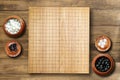 Goban, Baduk, Weiqi or Maklom - Traditional asian strategy board game. black and white stones boardgame - top view