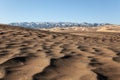 Gobi Desert Singing Sand Dunes mountain at background