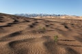 Gobi Desert Singing Sand Dunes mountain at background