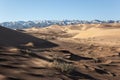 Gobi Desert Singing Sand Dunes mountain at background