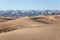 Gobi Desert Singing Sand Dunes mountain at background