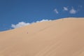 Gobi Desert Singing Sand Dunes skiing snowboarding Royalty Free Stock Photo