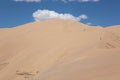 Gobi Desert Singing Sand Dunes skiing snowboarding Royalty Free Stock Photo