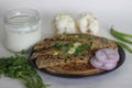 Gobi paratha or cauliflower paratha is a type of paratha or parantha or flatbread, that is stuffed with flavoured cauliflower and