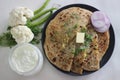 Gobi paratha or cauliflower paratha is a type of paratha or parantha or flatbread, that is stuffed with flavoured cauliflower and