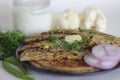 Gobi paratha or cauliflower paratha is a type of paratha or parantha or flatbread, that is stuffed with flavoured cauliflower and