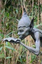 Goblin drinking from leaf. Sculpture by David Goode