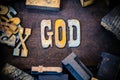 God Concept Wood and Rusted Metal Letters Royalty Free Stock Photo
