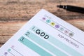 God first, Christian top priority list handwritten in notebook on wooden table Royalty Free Stock Photo