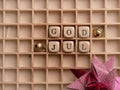 God Jul on small wooden blocks with a red Christmas decoration Royalty Free Stock Photo
