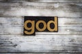 God Letterpress Word on Wooden Background Royalty Free Stock Photo