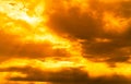 God light. Dramatic golden cloudy sky with sun beam. Yellow sun rays through  golden clouds. God light from heaven for hope and Royalty Free Stock Photo