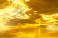 God light. Dramatic golden cloudy sky with sun beam. Yellow sun rays through golden clouds. God light from heaven for hope and Royalty Free Stock Photo