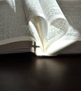 God is love, closeup pages of an open book, with heart shaped pages Royalty Free Stock Photo