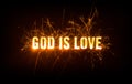 God Is Love title on dark background. Royalty Free Stock Photo