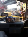 God and smoke Inside the taxi,Kolkata City, INDIA , 11th APRIL 2