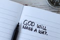 God will make a way, handwritten quote in notebook with compass Royalty Free Stock Photo