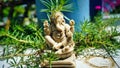 Statue of lord Gansha made by white marble. God Ganesha statue in the garden