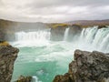 Godafoss waterfall in Iceland plunge pool full of turquoise water Royalty Free Stock Photo