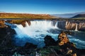 Godafoss waterfall at sunset. Fantastic landscape. Beautiful cumulus clouds. Iceland Europe Royalty Free Stock Photo